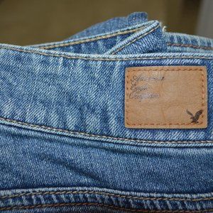 American Eagle Kick Bootcut, Stretch Size 4 Reg Med rise, Slightly Flared Faded